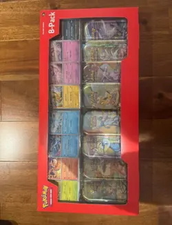 Pokemon TCG: Scarlet & Violet Prismatic Evolutions 8 Pack Mini Tin Set (Costco) - Image 1