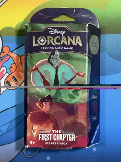 The First Chapter Ruby & Emerald Disney Lorcana TCG Starter Deck Cruella Aladdin 4050368981707 - Image 1