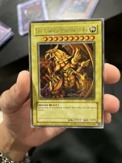 Yu-Gi-Oh the Winged Dragon of Ra DOD-001 Secret Rare Unlimited Card LP Condition - Image 1