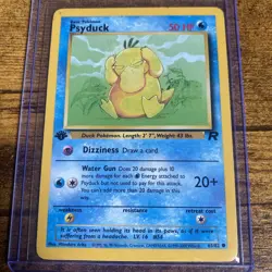 Pokemon TCG: Psyduck Team Rocket 1st Edition 65/82 LP - Image 1