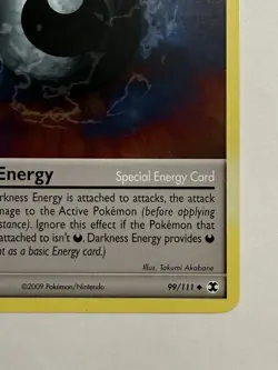 MP Darkness Energy 99/111 Rising Rivals Special Pokemon card English - Image 3