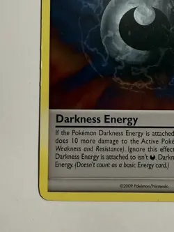 MP Darkness Energy 99/111 Rising Rivals Special Pokemon card English - Image 4