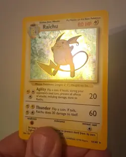 Raichu (14/102) Holo Base Set Pokemon Card - Image 1
