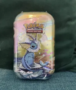 Pokemon TCG: Scarlet & Violet—Prismatic Evolutions Mini Tin – Vaporeon - Image 1