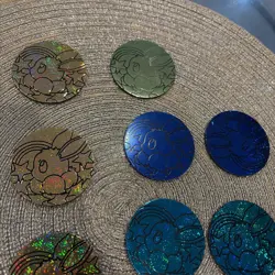 Pokemon Prismatic Evolutions Eevee Coins Set of 19 from Mini Tins - Image 3