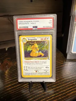 PSA 7 Dragonite Holo 4/62 Fossil Unlimited Pokemon Graded Card - Image 1