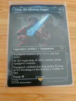 MTG Sting, the Glinting Dagger (FOIL Borderless) 0409 Lord of the Rings M/NM - Image 1