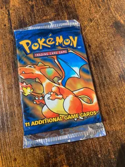 Sealed 1999 Pokemon Base Set Unlimited Booster Pack: Charizard - Image 1