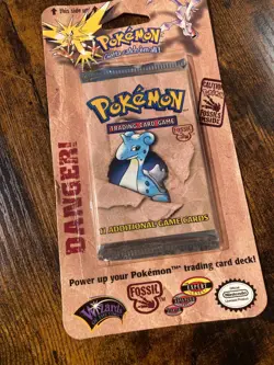 Sealed 1999 Pokemon Unlimited Fossil Booster Pack: Lapras - Image 1