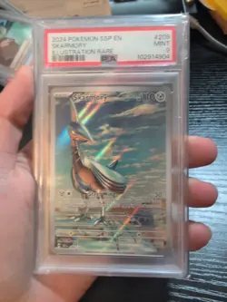 PSA 9 Skarmory 209/191 Illustration Rare Surging Sparks Pokemon - Image 1