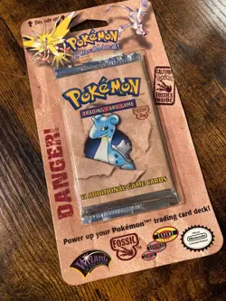 Sealed 1999 Pokemon Unlimited Fossil Booster Pack: Lapras - Image 1
