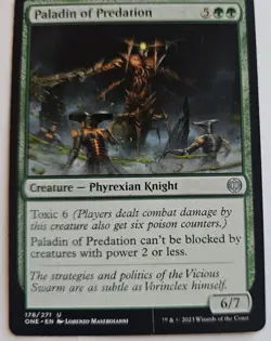 MTG Magic The Gathering Card Paladin of Predation Creature Phyrexian Knight 2021 - Image 1