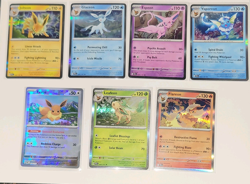 Pokemon TCG holo eveelution lot plus evee pokeball reverse prismatic evolutions - Image 1
