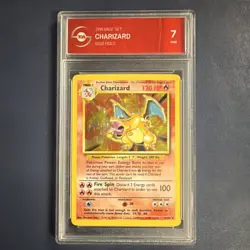 Charizard 4/102 Base Set Holo Rare TGA Graded 7 NM Pokemon TCG - Image 1