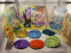 Pokemon Prismatic Evolutions Mini Tins Coins And Art Cards - Image 1