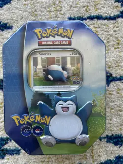 Pokemon TCG 2022 Collector's Tin Pokemon Go Featuring Snorlax Factory Sealed - Image 1