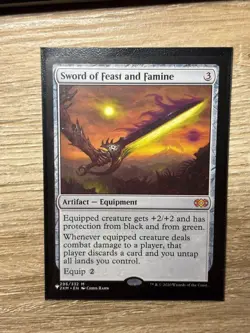 MTG, Sword of Feast and Famine -The List Reprints Regular NM - Image 1