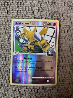 2009 Pokemon Platinum Rising Rivals 38/111 Alakazam Reverse Holo LP Rare Card - Image 1
