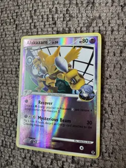 2009 Pokemon Platinum Rising Rivals 38/111 Alakazam Reverse Holo LP Rare Card - Image 2