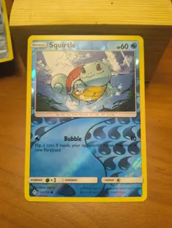 Pokemon TCG Squirtle 33/214 SM Unbroken Bonds (SM10) Rverse Holo Near Mint - Image 1
