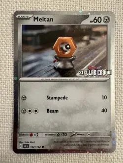 Meltan 102/142 Stellar Crown Stamped Cosmo Foil - Pokemon TCG Promo NM - Image 1