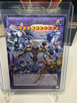 Yu-Gi-Oh! Wake Up Your Elemental HERO RA05-EN142 1st Edition Extended Art Ultra - Image 1