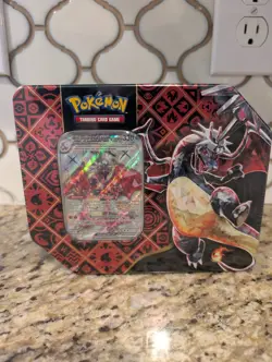 Pokemon TCG Sealed Charizard Paldean Fates Tin - Image 1