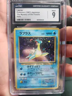 1997 Holo Fossil Lapras. CGC Grade 9. Pokemon TCG. Japanese. w/Swirl - Image 1