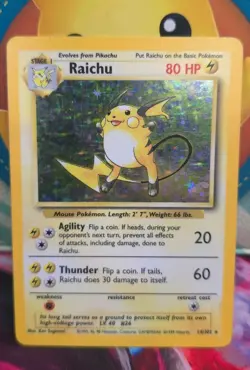 Pokemon Raichu Base Set 14/102 Holo Rare 1999 Wizards Copyright Holo Card - Image 1