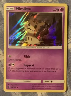 Mimikyu 58/145 Guardians Rising Holo Rare Pokemon Card NM - Image 1