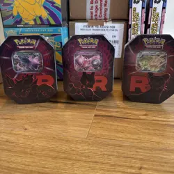 Pokemon TCG Team Rocket Tin Set of 3 Sealed Booster Packs New UK - Image 1