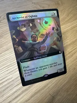 Archivist of Oghma - Battle for Baldur's Gate - FOIL Borderless - CLB 553 - Image 1