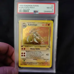 1999 POKEMON FOSSIL 1ST EDITION #9 KABUTOPS-HOLO PSA 8 - Image 1