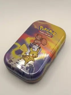 Pokemon Mystery Tin, 16 Cards, 1x V card, 2x sleeves, pikachu and vulpix tin art - Image 2