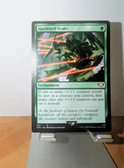 Hardened Scales Universes Beyond: Warhammer 40000 - MTG - NM - Image 1