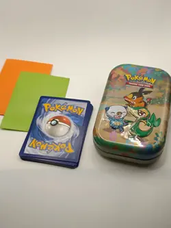 Pokemon Mystery Tin - 15 Cards incl 1 V - Snivy, Tepig and Oshawot Tin Design - Image 1
