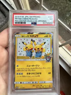 2019 P.M. JPN SM Promo Pikachu Card 407/ SM -P PM Center Osaka, PSA 7 - Image 1