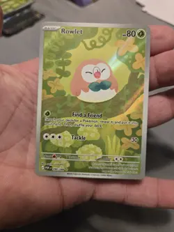 Pokemon Rowlet 090/088 POR Rare Basic 80 HP Holo Card English - Image 1