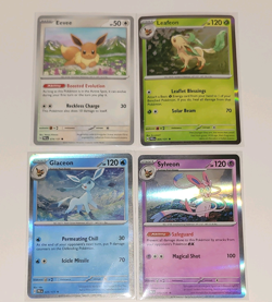 Pokemon Prismatic Evolutions Lot - Eevee, Holo Leafeon, Glaceon, & Sylveon - Image 1