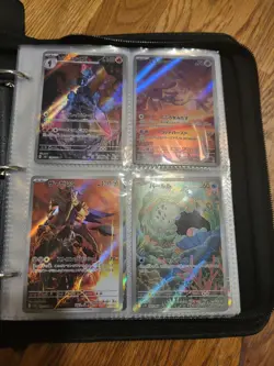 Pokemon Binder With Cards Inside Surging Sparks/DRivals/Mcdonalds Promos - Image 1