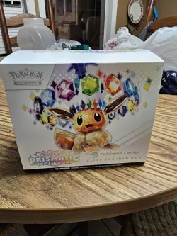Prismatic Evolutions Pokemon Center Exclusive Elite Trainer Box OPENED IN HAND - Image 1