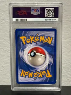1999 POKEMON FOSSIL 1ST ED #60 GAMBLER PSA 9 - Image 2