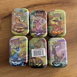 6x Pokemon TCG Scarlet & Violet Prismatic Evolutions Mini Tin Brand new & Sealed - Image 1
