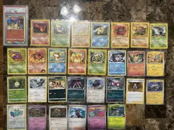 Pokemon Card Lot (30 Cards Plus PSA 9 Charizard Holo Amazing Volt Tackle) - Image 1
