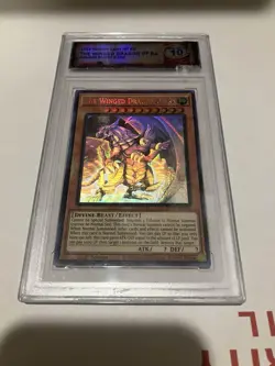 YuGiOh | DSG 10 | 1st Edition Winged Dragon of Ra Ghost Rare | PSA 10 Potential - Image 1