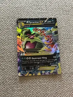 Pokemon Mega MTryranitar EX trading card. - Image 1