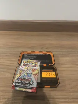 23.34g HEAVY Pokemon Prismatic Evolutions Booster Pack Sealed - Holo ChanceU - Image 1
