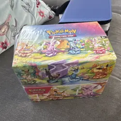 Pokemon TCG Prismatic Evolutions Mini Tin Display Case | 8 Tins / Factory Sealed - Image 1