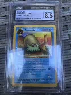 1999 POKEMON FOSSIL UNLIMITED #52 OMANYTE CGC 8.5 - Image 1
