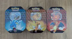 Pokemon Hidden Fates GX Tins Set of 3 - Charizard, Gyarados, Raichu New & Sealed - Image 1